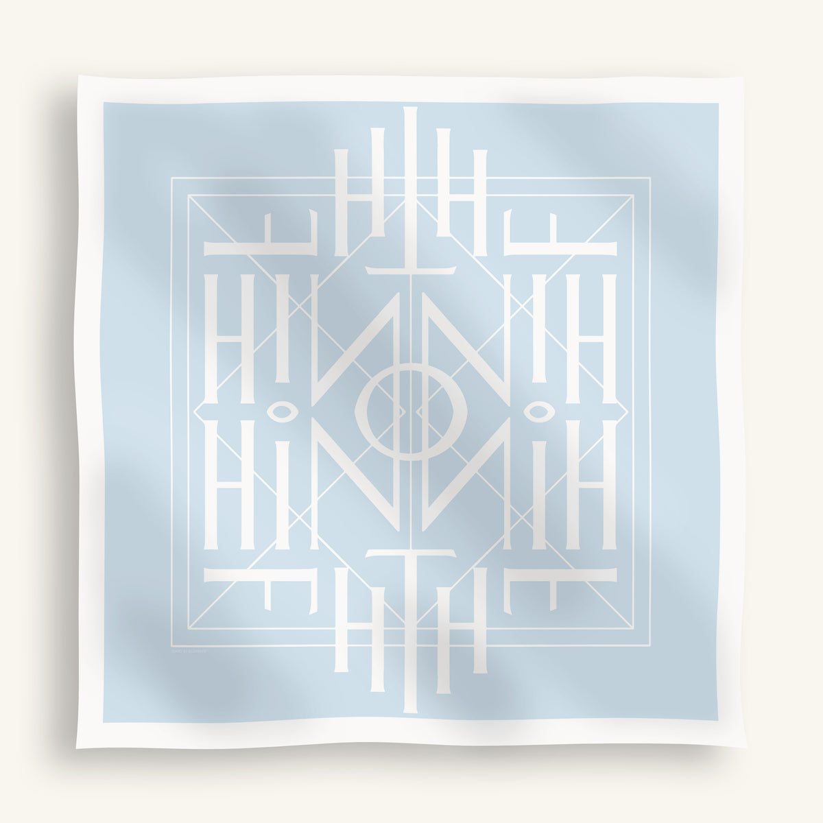 A square art print featuring a symmetrical white geometric Art Deco style pattern on a light blue background, displayed with a soft drop shadow on a warm off-white background.