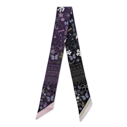 Purple and black Paris silk twilly featuring hand-drawn Paris landmarks and fashion-inspired details, including the Eiffel Tower.