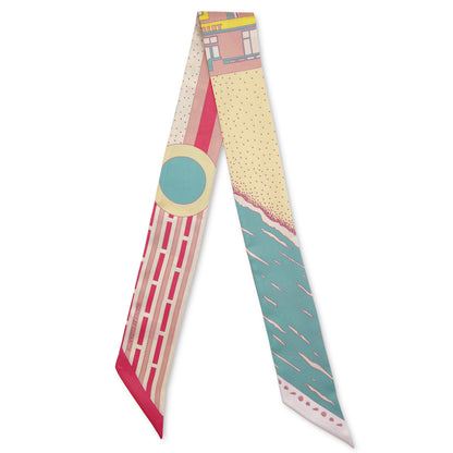 Rosy Splash Miami Beach silk twilly featuring a classic miami coastal beach and a geometric pattern inspired by Miami Beach Art Deco architecture in bright pink, turquoise, and yellow tones.