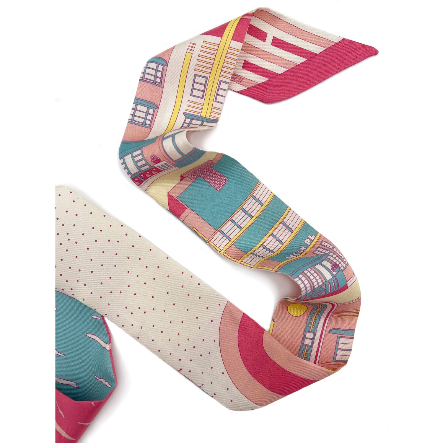 Rosy Splash Miami Beach silk twilly featuring hand-drawn Art Deco architecture, coastal scenery, and geometric design details in bright pink, turquoise, and yellow tones displayed in a folded lay-flat view showing both sides of the design.