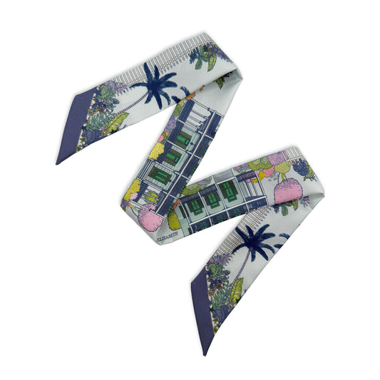 Seafoam Blue Key West silk twilly featuring hand-drawn palm trees, tropical florals, iconic florida keys architecture, and coastal-inspired artwork in blue and green tones.